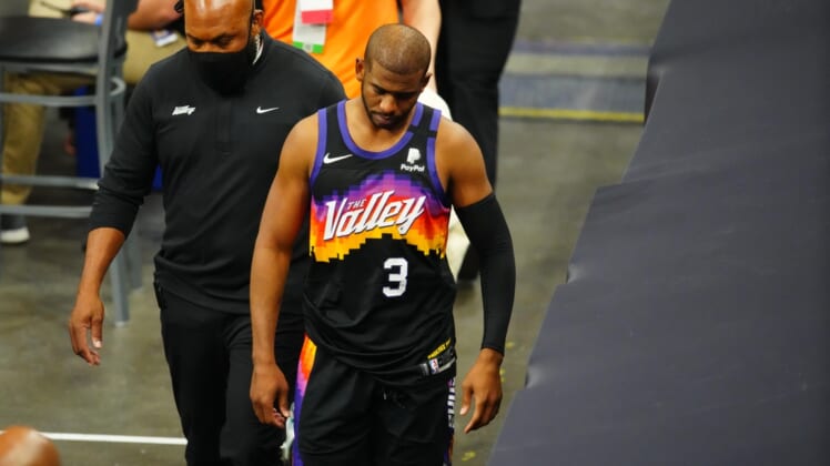Jun 1, 2021; Phoenix, Arizona, USA; Phoenix Suns guard Chris Paul (3) leaves the game after suffering an injury against the Los Angeles Lakers in the second half during game five in the first round of the 2021 NBA Playoffs at Phoenix Suns Arena. Mandatory Credit: Mark J. Rebilas-USA TODAY Sports