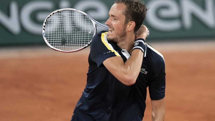 Jun 2, 2021; Paris, France;  Daniil Medvedev (RUS) in action during his match against Tommy Paul (USA) on day four of the French Open at Stade Roland Garros. Mandatory Credit: Susan Mullane-USA TODAY Sports