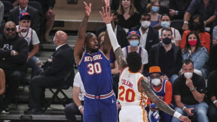 Jun 2, 2021; New York, New York, USA; New York Knicks forward Julius Randle (30) takes a three point shot in the first quarter against the Atlanta Hawks during game five in the first round of the 2021 NBA Playoffs. at Madison Square Garden. Mandatory Credit: Wendell Cruz-USA TODAY Sports
