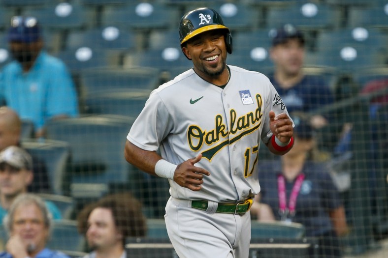 Jun 2, 2021; Seattle, Washington, USA; Oakland Athletics shortstop Elvis Andrus (17) reacts after scoring a run against the Seattle Mariners during the third inning at T-Mobile Park. Mandatory Credit: Joe Nicholson-USA TODAY Sports