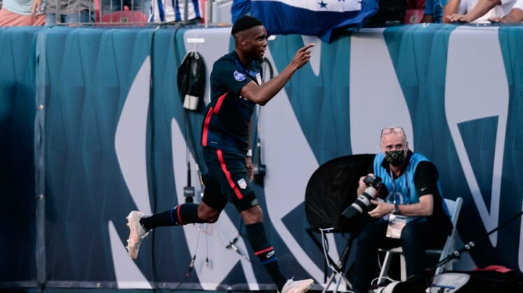 Jun 3, 2021; Denver, Colorado, USA; United States forward Jordan Siebatcheu Pefok (16) celebrates after his goal in the second half against Honduras during the semifinals of the 2021 CONCACAF Nations League soccer series at Empower Field at Mile High. Mandatory Credit: Isaiah J. Downing-USA TODAY Sports