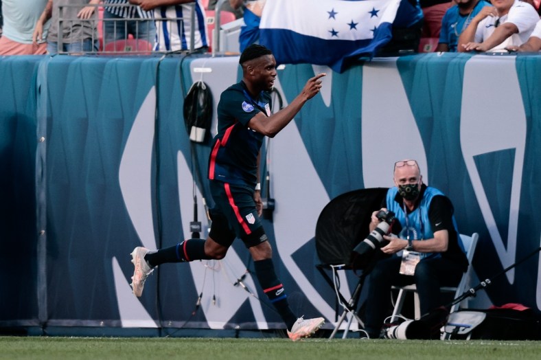 Jun 3, 2021; Denver, Colorado, USA; United States forward Jordan Siebatcheu Pefok (16) celebrates after his goal in the second half against Honduras during the semifinals of the 2021 CONCACAF Nations League soccer series at Empower Field at Mile High. Mandatory Credit: Isaiah J. Downing-USA TODAY Sports