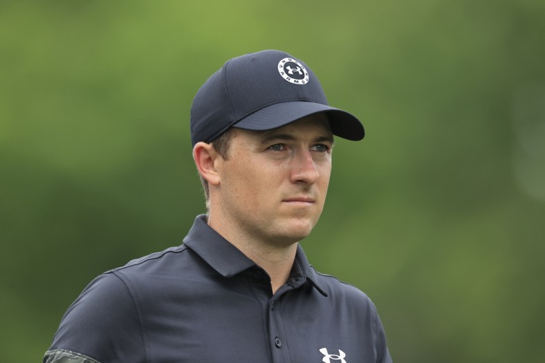 Jun 4, 2021; Dublin, Ohio, USA; Jordan Spieth leaves the 18th tee during the conclusion of the rain-delayed first round of the Memorial Tournament golf tournament. Mandatory Credit: Aaron Doster-USA TODAY Sports