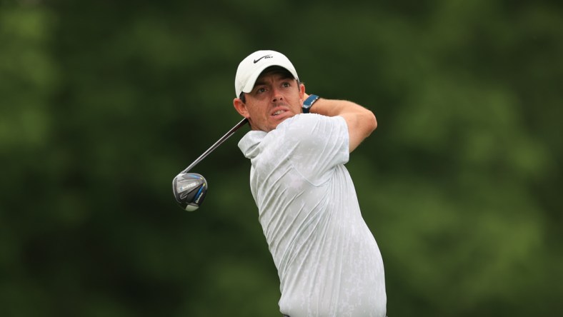 Jun 4, 2021; Dublin, Ohio, USA; Rory McIlroy hits his tee shot on the 18th hole during the conclusion of the rain-delayed first round of the Memorial Tournament golf tournament. Mandatory Credit: Aaron Doster-USA TODAY Sports