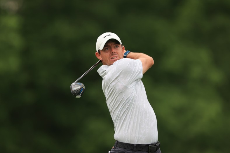 Jun 4, 2021; Dublin, Ohio, USA; Rory McIlroy hits his tee shot on the 18th hole during the conclusion of the rain-delayed first round of the Memorial Tournament golf tournament. Mandatory Credit: Aaron Doster-USA TODAY Sports