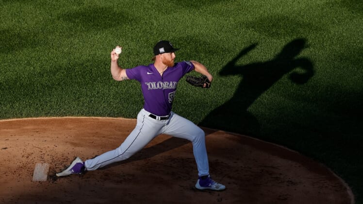 Jun 4, 2021; Denver, Colorado, USA; Colorado Rockies starting pitcher Jon Gray (55) pitches in the first inning against the Oakland Athletics at Coors Field. Mandatory Credit: Isaiah J. Downing-USA TODAY Sports