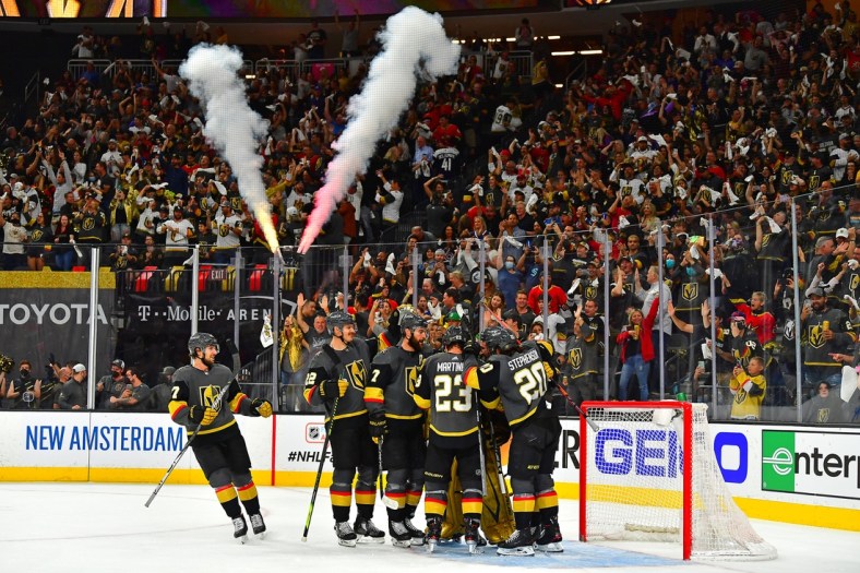 Jun 4, 2021; Las Vegas, Nevada, USA; Vegas Golden Knights players celebrate around Vegas Golden Knights goaltender Marc-Andre Fleury (29) after defeating the Colorado Avalanche 3-2 in game three of the second round of the 2021 Stanley Cup Playoffs at T-Mobile Arena. Mandatory Credit: Stephen R. Sylvanie-USA TODAY Sports
