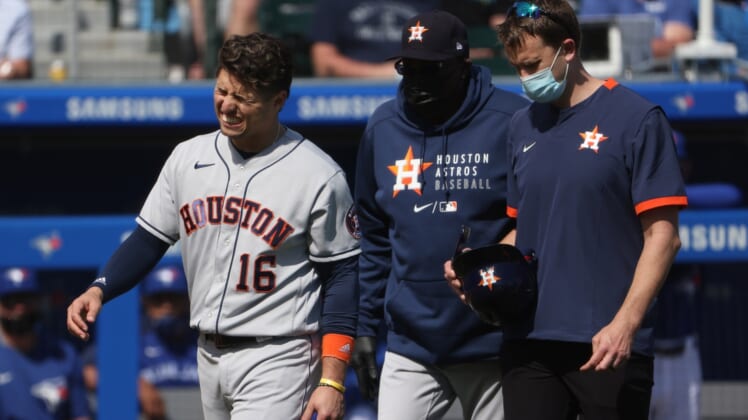 Jun 5, 2021; Buffalo, New York, USA; Houston Astros left fielder Aledmys Diaz (16) leaves the game after being hit by a pitch during the fourth inning against the Toronto Blue Jays at Sahlen Field. Mandatory Credit: Timothy T. Ludwig-USA TODAY Sports