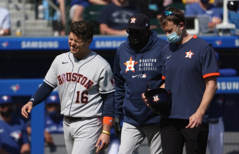 Jun 5, 2021; Buffalo, New York, USA; Houston Astros left fielder Aledmys Diaz (16) leaves the game after being hit by a pitch during the fourth inning against the Toronto Blue Jays at Sahlen Field. Mandatory Credit: Timothy T. Ludwig-USA TODAY Sports