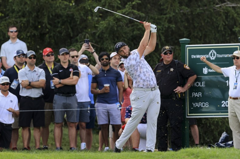 Jun 5, 2021; Dublin, Ohio, USA; Jon Rahm hits his tee shot on the 16th hole during the third round of the Memorial Tournament golf tourney. Mandatory Credit: Aaron Doster-USA TODAY Sports