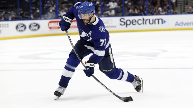 Jun 5, 2021; Tampa, Florida, USA; Tampa Bay Lightning defenseman Victor Hedman (77) passes the puck against the Carolina Hurricanes during the third period in game four of the second round of the 2021 Stanley Cup Playoffs at Amalie Arena. Mandatory Credit: Kim Klement-USA TODAY Sports