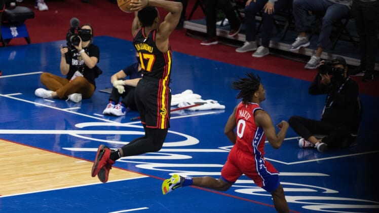 Jun 6, 2021; Philadelphia, Pennsylvania, USA; Atlanta Hawks forward Onyeka Okongwu (17) drives for a dunk past Philadelphia 76ers guard Tyrese Maxey (0) during the second quarter of game one in the second round of the 2021 NBA Playoffs at Wells Fargo Center. Mandatory Credit: Bill Streicher-USA TODAY Sports