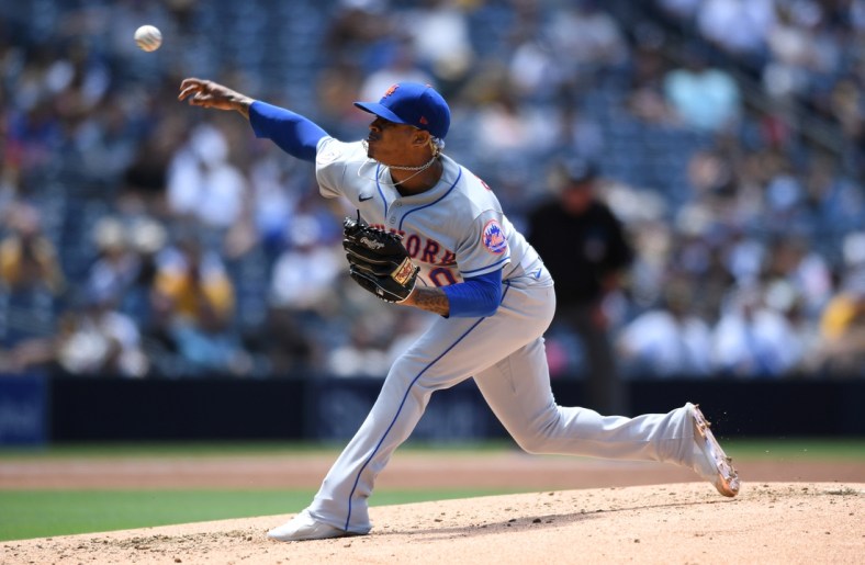 Jun 6, 2021; San Diego, California, USA; New York Mets starting pitcher Marcus Stroman (0) throws a pitch against the San Diego Padres during the third inning at Petco Park. Mandatory Credit: Orlando Ramirez-USA TODAY Sports