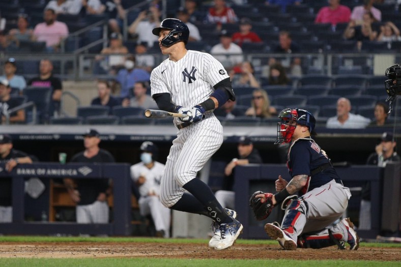 Jun 6, 2021; Bronx, New York, USA; New York Yankees designated hitter Aaron Judge (99) follows through on an RBI fielder's choice against the Boston Red Sox during the fourth inning at Yankee Stadium. Mandatory Credit: Brad Penner-USA TODAY Sports