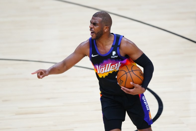 Jun 7, 2021; Phoenix, Arizona, USA; Phoenix Suns guard Chris Paul reacts against the Denver Nuggets in the first half during game one in the second round of the 2021 NBA Playoffs at Phoenix Suns Arena. Mandatory Credit: Mark J. Rebilas-USA TODAY Sports