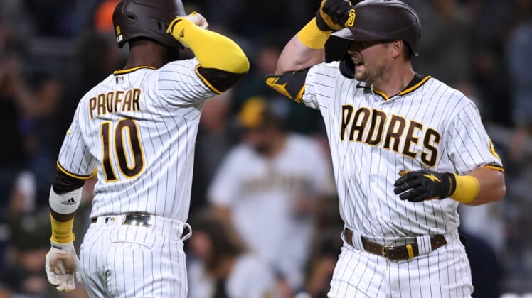 Jun 7, 2021; San Diego, California, USA; San Diego Padres right fielder Brian O'Grady (right) is congratulated by center fielder Jurickson Profar (10) after hitting a two-run home run against the Chicago Cubs during the third inning at Petco Park. Mandatory Credit: Orlando Ramirez-USA TODAY Sports