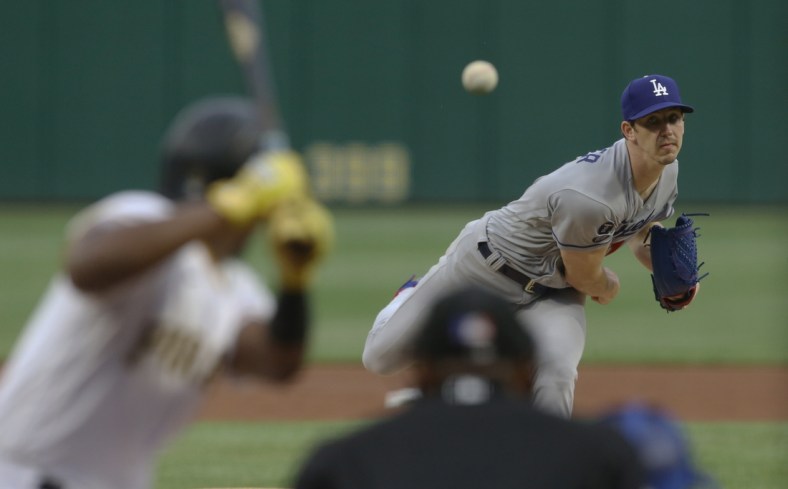 Jun 8, 2021; Pittsburgh, Pennsylvania, USA;  Los Angeles Dodgers starting pitcher Walker Buehler (21) pithes to Pittsburgh Pirates third baseman Ke'Bryan Hayes (13) during the first inning at PNC Park. Mandatory Credit: Charles LeClaire-USA TODAY Sports