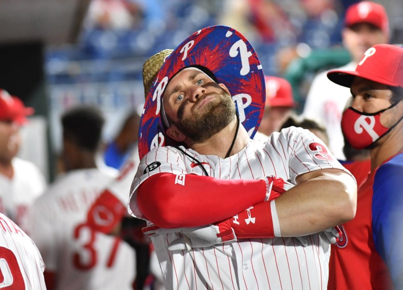 Jun 8, 2021; Philadelphia, Pennsylvania, USA; Philadelphia Phillies right fielder Bryce Harper (3) celebrates in the dugout after hitting a solo home run against the Atlanta Braves during the fourth inning at Citizens Bank Park. Mandatory Credit: Eric Hartline-USA TODAY Sports