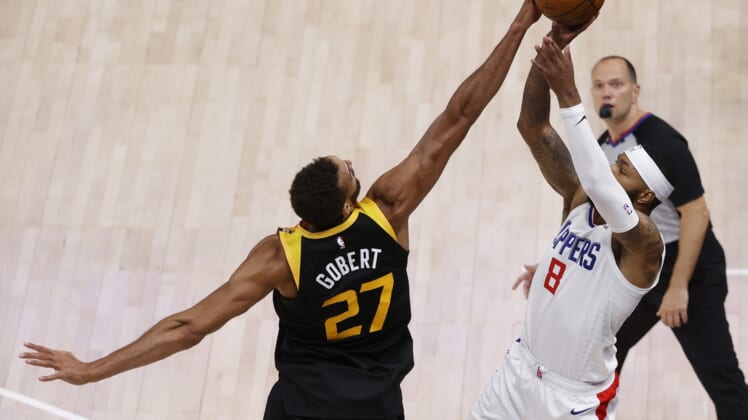 Jun 8, 2021; Salt Lake City, Utah, USA; Utah Jazz center Rudy Gobert (27) blocks the shot by LA Clippers forward Marcus Morris Sr. (8) at the buzzer to end the game during game one in the second round of the 2021 NBA Playoffs. at Vivint Arena. Mandatory Credit: Jeffrey Swinger-USA TODAY Sports