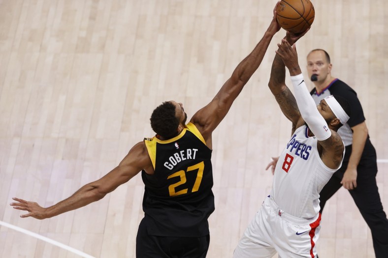 Jun 8, 2021; Salt Lake City, Utah, USA; Utah Jazz center Rudy Gobert (27) blocks the shot by LA Clippers forward Marcus Morris Sr. (8) at the buzzer to end the game during game one in the second round of the 2021 NBA Playoffs. at Vivint Arena. Mandatory Credit: Jeffrey Swinger-USA TODAY Sports