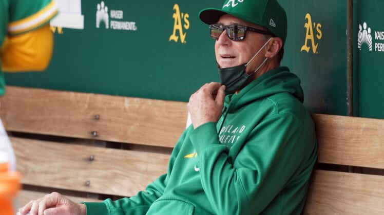 May 29, 2021; Oakland, California, USA; Oakland Athletics manager Bob Melvin (6) sits in the dugout before the game against the Los Angeles Angels at RingCentral Coliseum. Mandatory Credit: Darren Yamashita-USA TODAY Sports