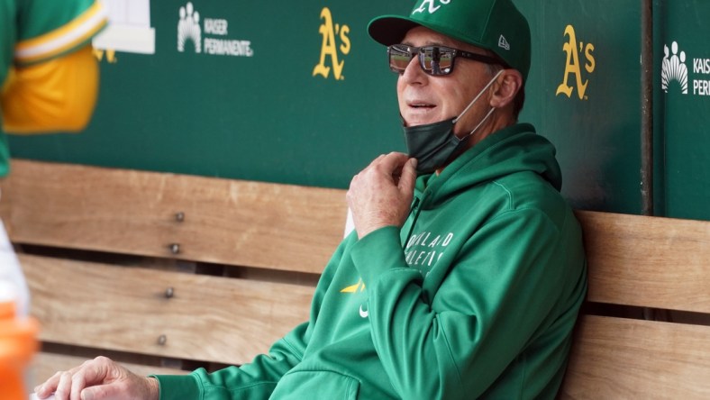 May 29, 2021; Oakland, California, USA; Oakland Athletics manager Bob Melvin (6) sits in the dugout before the game against the Los Angeles Angels at RingCentral Coliseum. Mandatory Credit: Darren Yamashita-USA TODAY Sports