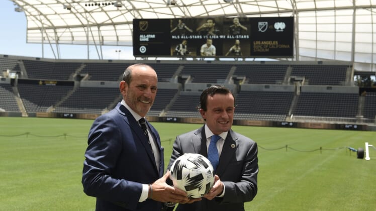 Jun 9, 2021; Los Angeles, CA, USA; MLS Commissioner Don Garber (left) and LIGA MX Executive President Mikel Arriola pose for a photo after announcing the location of the 2021 MLS All-Star Game to be held at Banc of California Stadium. Mandatory Credit: Kelvin Kuo-USA TODAY Sports