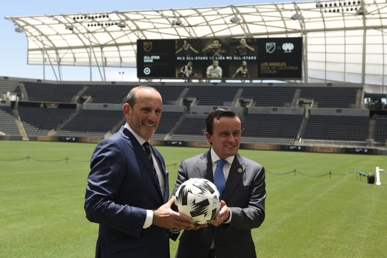 Jun 9, 2021; Los Angeles, CA, USA; MLS Commissioner Don Garber (left) and LIGA MX Executive President Mikel Arriola pose for a photo after announcing the location of the 2021 MLS All-Star Game to be held at Banc of California Stadium. Mandatory Credit: Kelvin Kuo-USA TODAY Sports