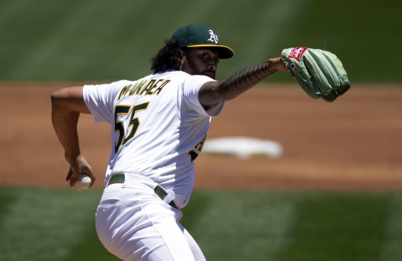 Jun 9, 2021; Oakland, California, USA; Oakland Athletics starting pitcher Sean Manaea (55) delivers a pitch against the Arizona Diamondbacks during the second inning at RingCentral Coliseum. Mandatory Credit: D. Ross Cameron-USA TODAY Sports