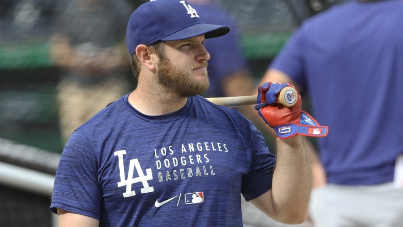 Jun 9, 2021; Pittsburgh, Pennsylvania, USA;  Los Angeles Dodgers first baseman Max Muncy (13) at the batting cage before playing the Pittsburgh Pirates at PNC Park. Mandatory Credit: Charles LeClaire-USA TODAY Sports