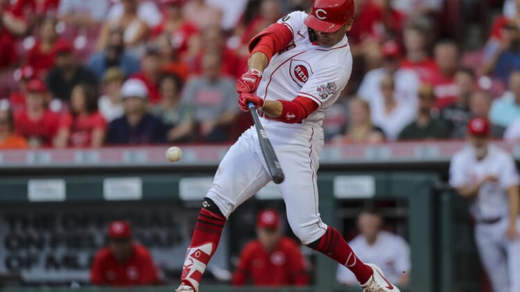 Jun 9, 2021; Cincinnati, Ohio, USA; Cincinnati Reds first baseman Joey Votto (19) hits against the Milwaukee Brewers in the first inning at Great American Ball Park. Mandatory Credit: Katie Stratman-USA TODAY Sports