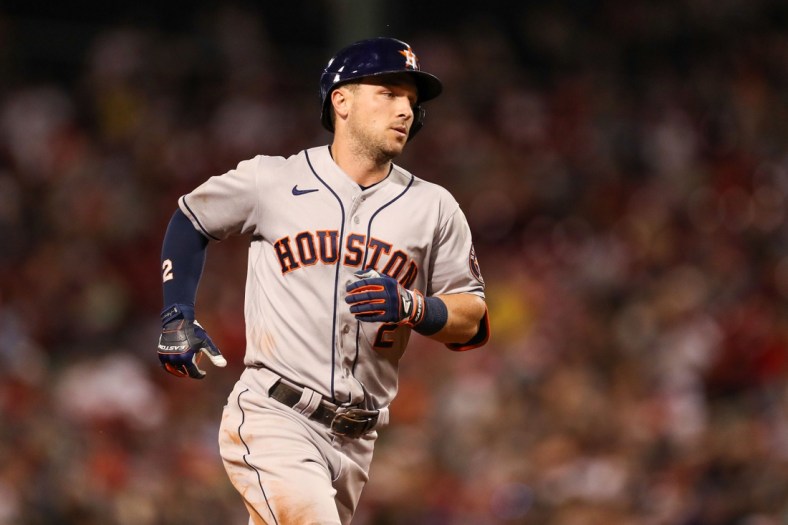 Jun 9, 2021; Boston, Massachusetts, USA; Houston Astros third baseman Alex Bregman (2) reacts after hitting a home run during the eighth inning against the Boston Red Sox at Fenway Park. Mandatory Credit: Paul Rutherford-USA TODAY Sports