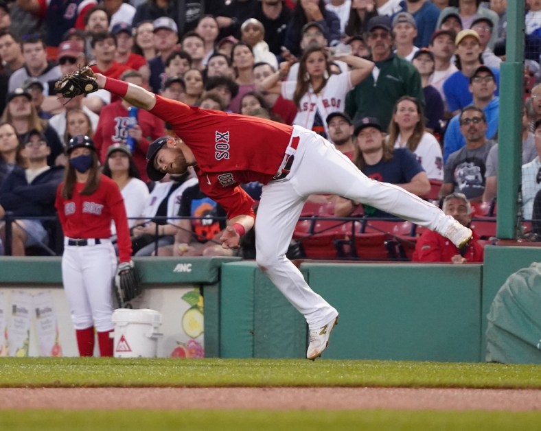Jun 10, 2021; Boston, Massachusetts, USA; Boston Red Sox third baseman Christian Arroyo (39) makes the catch to end the inning against the Houston Astros in the third inning at Fenway Park. Mandatory Credit: David Butler II-USA TODAY Sports