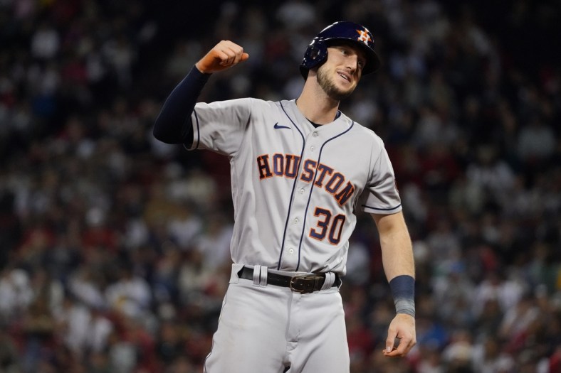 Jun 10, 2021; Boston, Massachusetts, USA; Houston Astros left fielder Kyle Tucker (30) reacts after his three RBI hit against the Boston Red Sox in the fifth inning at Fenway Park. Mandatory Credit: David Butler II-USA TODAY Sports