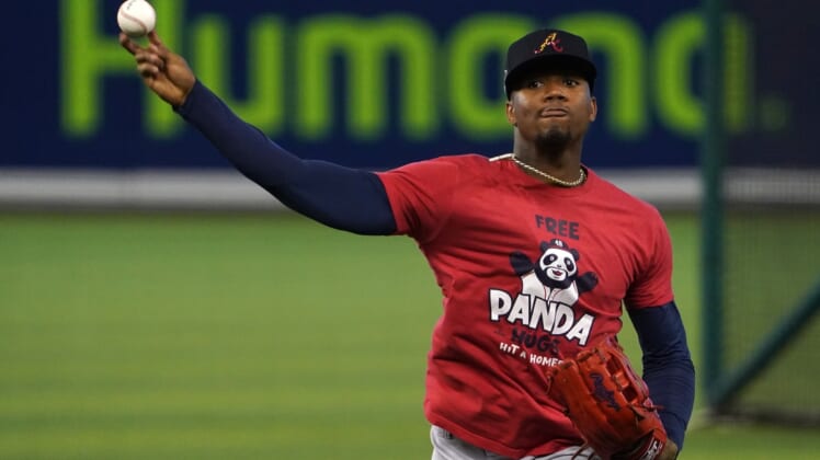 Jun 12, 2021; Miami, Florida, USA; Atlanta Braves right fielder Ronald Acuna Jr. (13) warms up prior to the game against the Miami Marlins at loanDepot park. Mandatory Credit: Jasen Vinlove-USA TODAY Sports