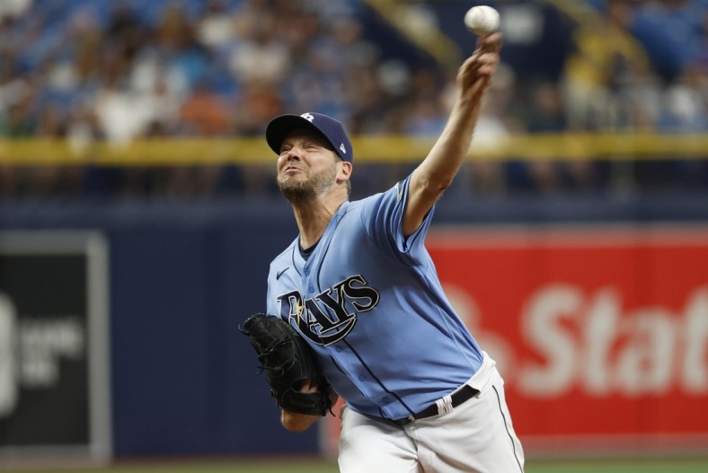 Jun 12, 2021; St. Petersburg, Florida, USA; Tampa Bay Rays starting pitcher Rich Hill (14) throws a pitch during the third inning against the Baltimore Orioles at Tropicana Field. Mandatory Credit: Kim Klement-USA TODAY Sports
