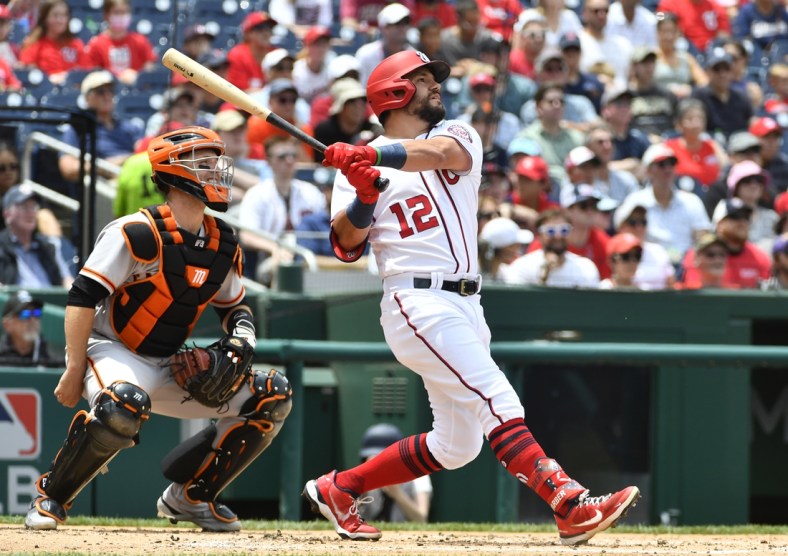 Jun 13, 2021; Washington, District of Columbia, USA; Washington Nationals left fielder Kyle Schwarber (12) hits a three run home run against the San Francisco Giants during the second inning at Nationals Park. Mandatory Credit: Brad Mills-USA TODAY Sports