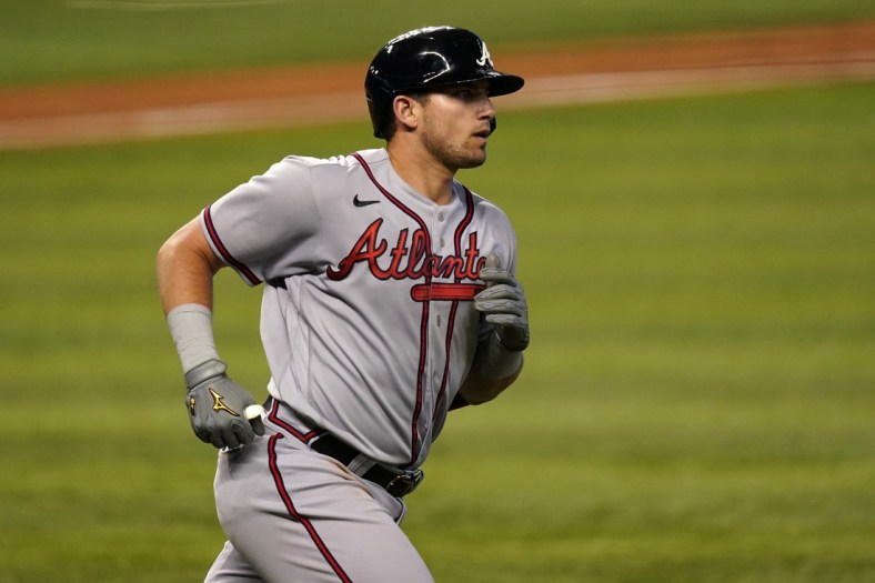 Jun 13, 2021; Miami, Florida, USA; Atlanta Braves third baseman Austin Riley (27) rounds the bases after hitting a solo homerun in the 3rd inning against the Miami Marlins at loanDepot park. Mandatory Credit: Jasen Vinlove-USA TODAY Sports