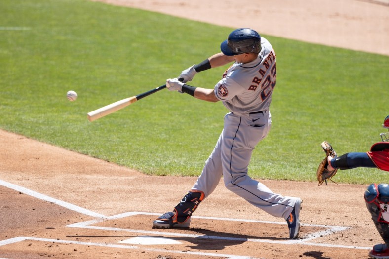 Jun 13, 2021; Minneapolis, Minnesota, USA; Houston Astros designated hitter Michael Brantley (23) hits a double during the first inning against the Minnesota Twins at Target Field. Mandatory Credit: Jordan Johnson-USA TODAY Sports