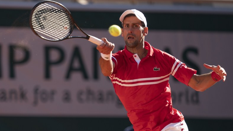 Jun 13, 2021; Paris, France; Novak Djokovic (SRB) in action during the men's final against Stefanos Tsitsipas (GRE) on day 15 of the French Open at Stade Roland Garros. Mandatory Credit: Susan Mullane-USA TODAY Sports