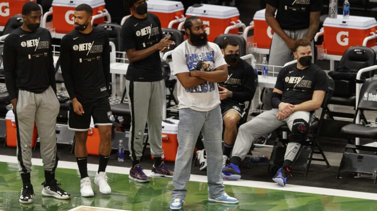 Jun 13, 2021; Milwaukee, Wisconsin, USA;  Brooklyn Nets guard James Harden stands in front of the bench during the third quarter against the Milwaukee Bucks during game four in the second round of the 2021 NBA Playoffs. at Fiserv Forum. Mandatory Credit: Jeff Hanisch-USA TODAY Sports