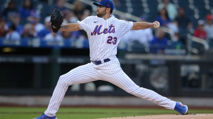 Jun 14, 2021; New York City, New York, USA; New York Mets starting pitcher David Peterson (23) pitches against the Chicago Cubs during the first inning at Citi Field. Mandatory Credit: Brad Penner-USA TODAY Sports