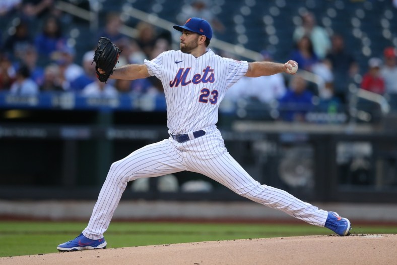 Jun 14, 2021; New York City, New York, USA; New York Mets starting pitcher David Peterson (23) pitches against the Chicago Cubs during the first inning at Citi Field. Mandatory Credit: Brad Penner-USA TODAY Sports