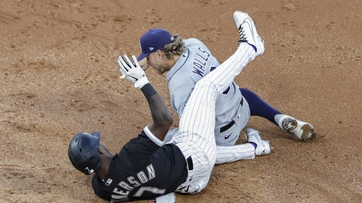 Jun 14, 2021; Chicago, Illinois, USA; Chicago White Sox shortstop Tim Anderson (7) is safe at second base after hitting a double as Tampa Bay Rays shortstop Taylor Walls (6) applies a late tag during the third inning at Guaranteed Rate Field. Mandatory Credit: Kamil Krzaczynski-USA TODAY Sports