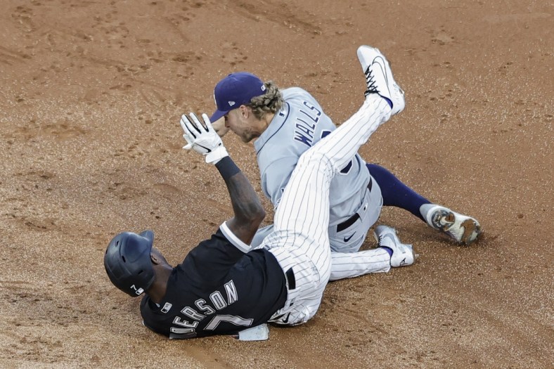 Jun 14, 2021; Chicago, Illinois, USA; Chicago White Sox shortstop Tim Anderson (7) is safe at second base after hitting a double as Tampa Bay Rays shortstop Taylor Walls (6) applies a late tag during the third inning at Guaranteed Rate Field. Mandatory Credit: Kamil Krzaczynski-USA TODAY Sports