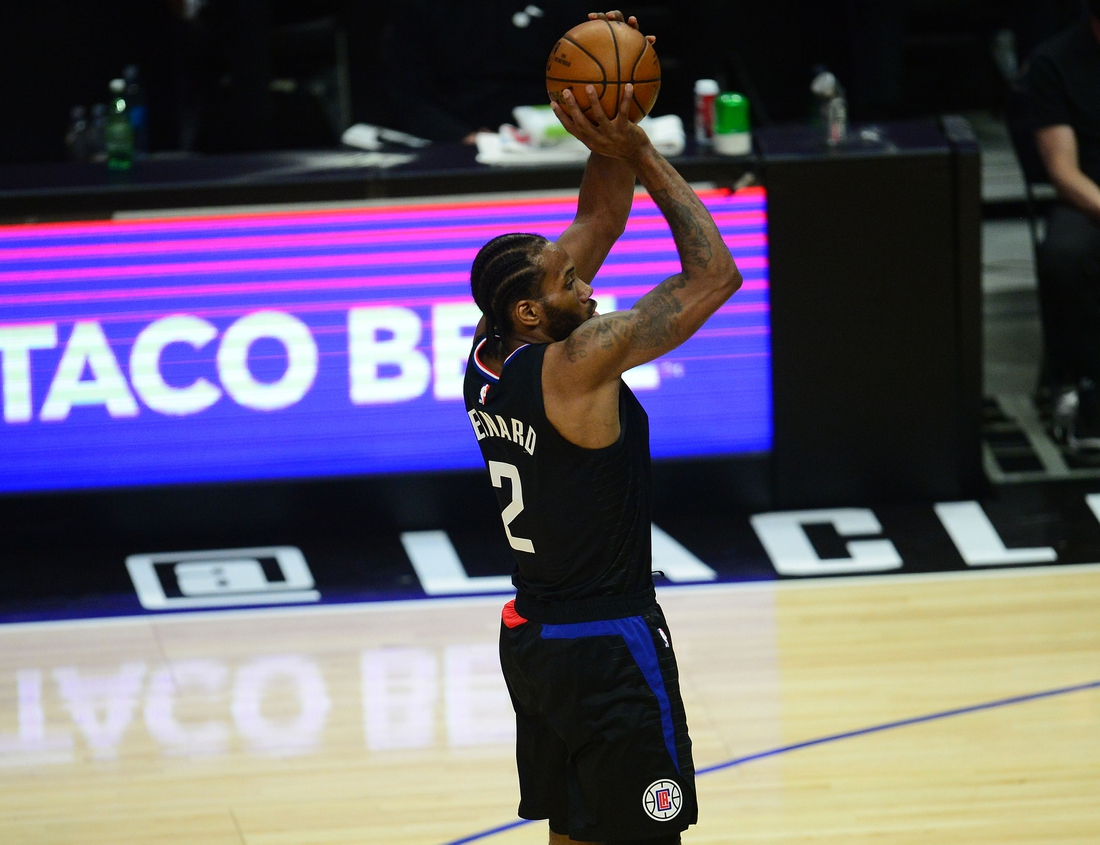 Jun 14, 2021; Los Angeles, California, USA; Los Angeles Clippers forward Kawhi Leonard (2) shoots against the Utah Jazz during the first half in game four in the second round of the 2021 NBA Playoffs. at Staples Center. Mandatory Credit: Gary A. Vasquez-USA TODAY Sports