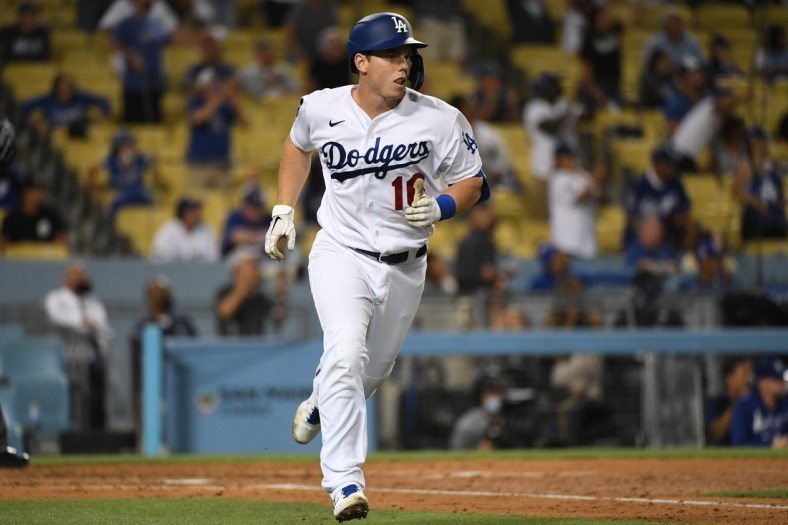 Jun 14, 2021; Los Angeles, California, USA; Los Angeles Dodgers catcher Will Smith (16) rounds the bases after hitting a two-run home run during the fourth inning against the Philadelphia Phillies at Dodger Stadium. Mandatory Credit: Richard Mackson-USA TODAY Sports