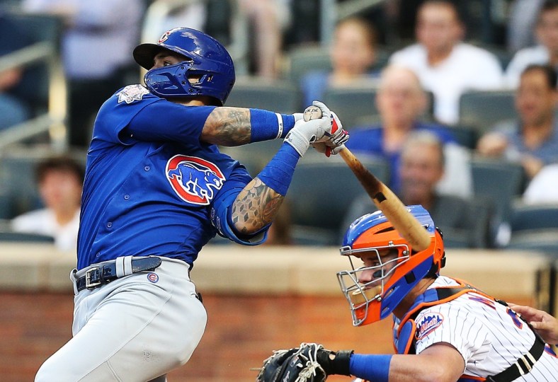 Jun 15, 2021; New York City, New York, USA; Chicago Cubs shortstop Javier Baez (9) hits a two run home run against the New York Mets during the third inning at Citi Field. Mandatory Credit: Andy Marlin-USA TODAY Sports