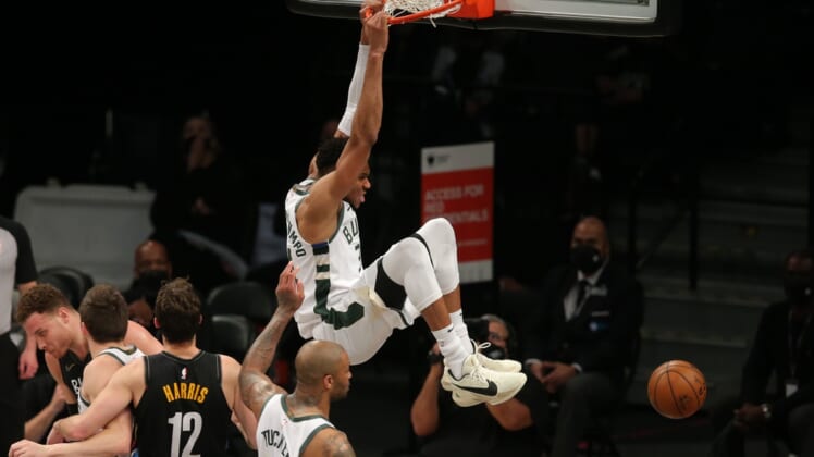 Jun 15, 2021; Brooklyn, New York, USA; Milwaukee Bucks power forward Giannis Antetokounmpo (34) dunks against the Brooklyn Nets during the third quarter of game five of the second round of the 2021 NBA Playoffs at Barclays Center. Mandatory Credit: Brad Penner-USA TODAY Sports