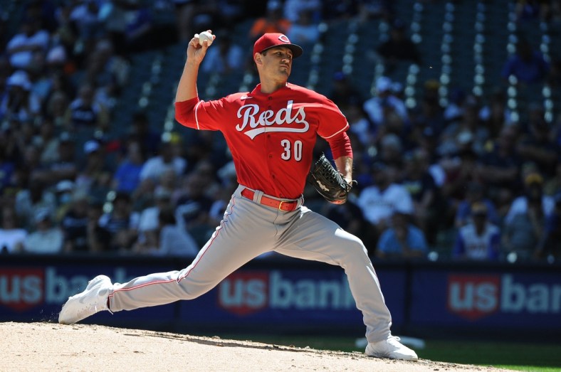 Jun 16, 2021; Milwaukee, Wisconsin, USA; Cincinnati Reds starting pitcher Tyler Mahle (30) delivers a pitch against the Milwaukee Brewers in the fourth inning at American Family Field. Mandatory Credit: Michael McLoone-USA TODAY Sports